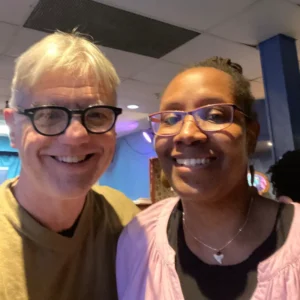 A man and a woman smiling